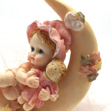 Precious Moments Figurine “Growing In Grace" Baby Girl on the Moon holding a Doll