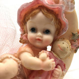 Precious Moments Figurine “Growing In Grace" Baby Girl on the Moon holding a Doll
