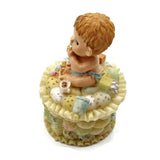 Precious Moments  Figurine “Growing In Grace" Baby Boy holding a bottle of Milk