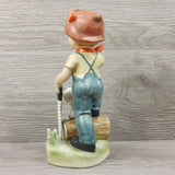 Vintage Porcelain Farm Boy w/Saw Wood & Dog 8"  Figurine Collection Collectible