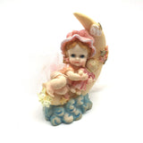 Precious Moments Figurine “Growing In Grace" Baby Girl on the Moon holding a Doll