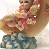 Precious Moments Figurine “Growing In Grace" Baby Girl on the Moon holding a Doll